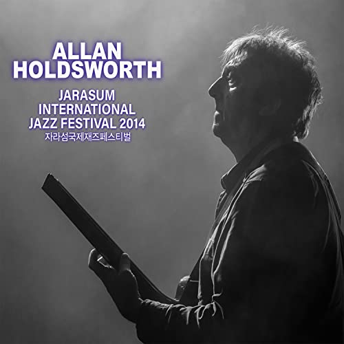 Black and white portrait of Allan Holdsworth with his guitar, Jarasum Jazz Festival 2014.