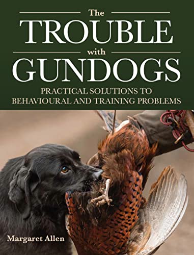 Book cover: black Labrador with a pheasant, title “The Trouble with Gundogs”.