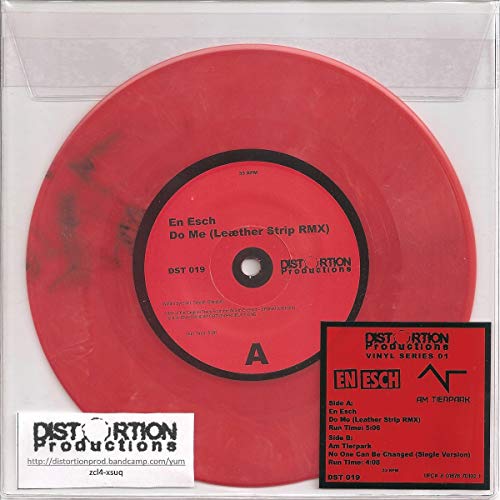 Red vinyl record with label and accompanying insert displaying tracklist.