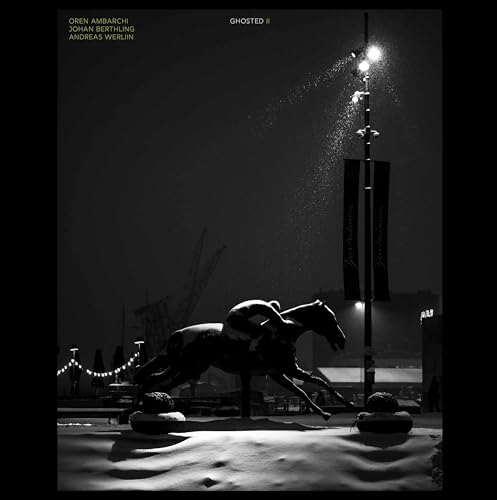 Black and white album cover with a statue of a horse in snow.