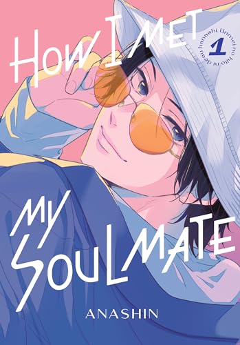 Manga cover featuring a young man with dark hair wearing a hat and glasses.