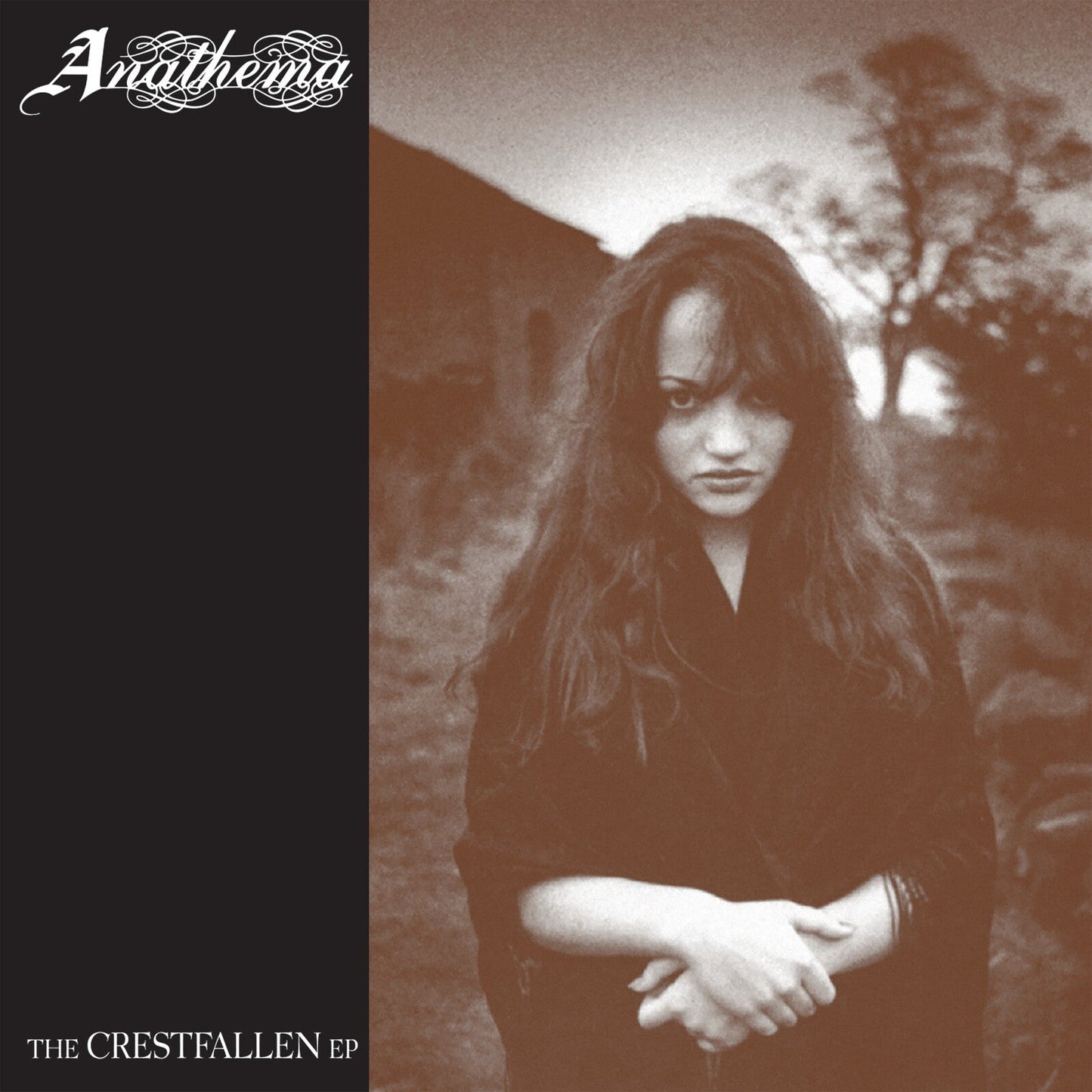Anathema's "Crestfallen" CD cover: sepia-toned portrait of a woman.