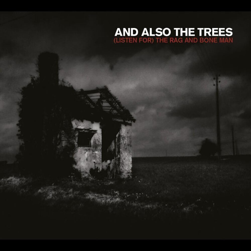 Black and white album cover featuring a dilapidated house in a field.