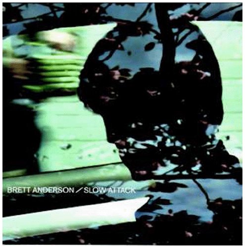 CD cover for Brett Anderson’s “Slow Attack” with a silhouetted face.