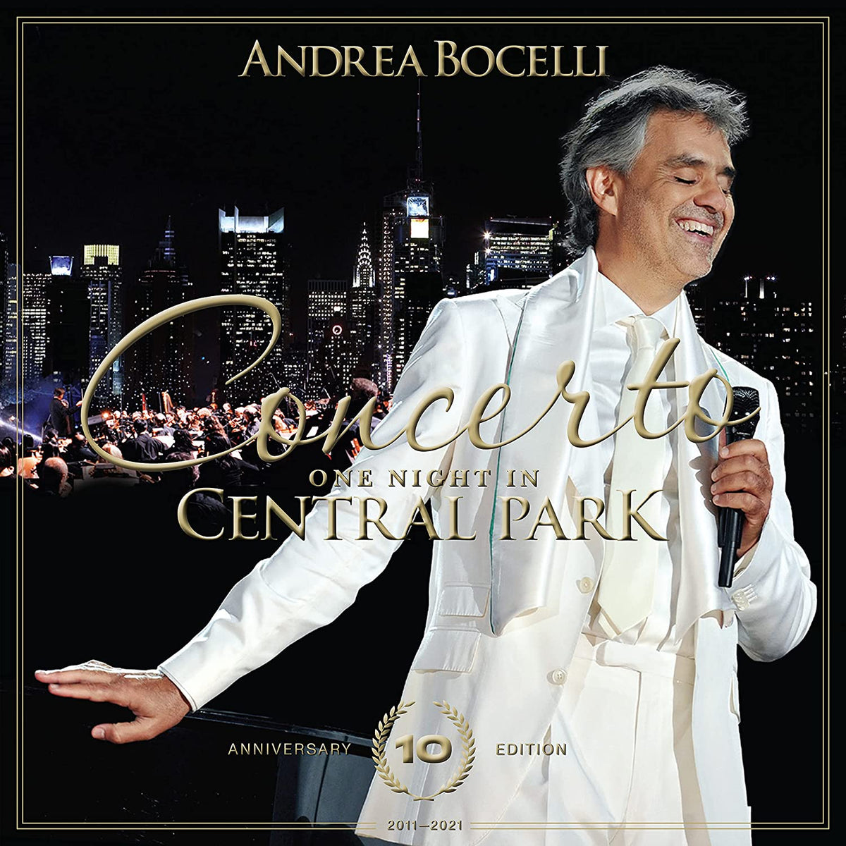 Andrea Bocelli CD cover featuring him in a white suit with a city backdrop.