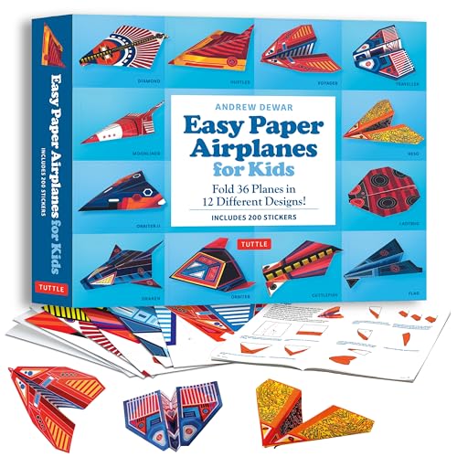 Box of paper airplane kit with folded examples and instruction sheets.