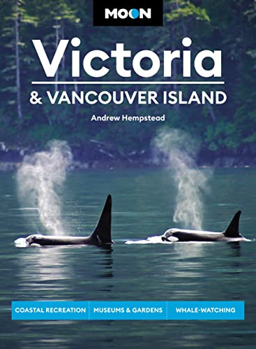 Travel guidebook cover featuring orcas and the text "Victoria & Vancouver Island".