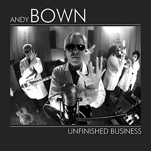 Black and white CD cover showing Andy Bown and band members wearing white lab coats.