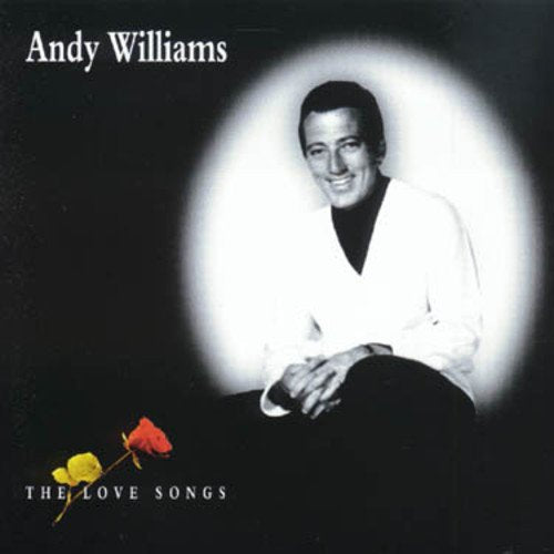 Andy Williams album cover featuring the artist in a spotlight with two roses below.