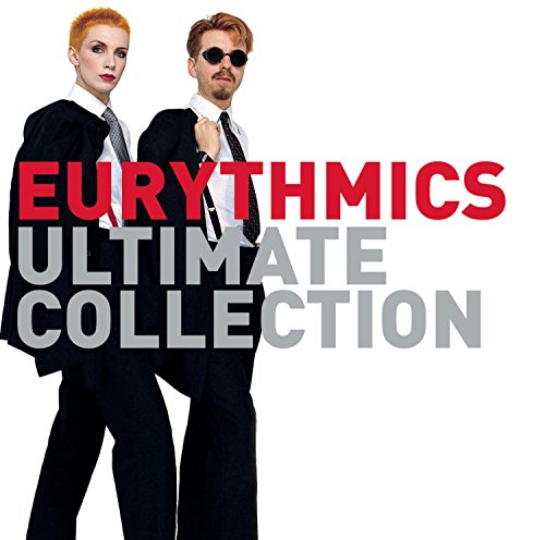 Eurythmics duo Annie Lennox and Dave Stewart in suits, album cover.