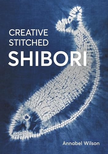 Book cover featuring a white stitched fish design on a dark blue shibori background.