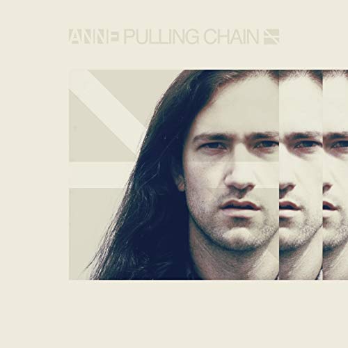 Album cover for “Anne - Pulling Chain” featuring a man’s fragmented face.