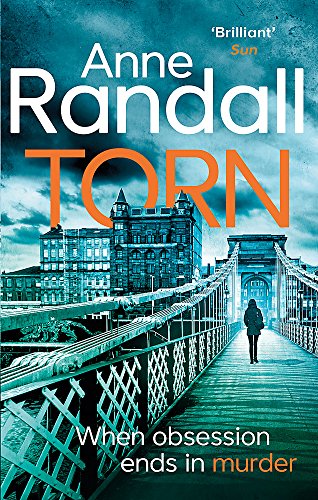Book cover: woman on bridge, city buildings in background, title "Torn".