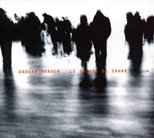 CD cover: blurred figures walking, with album title and artist name.