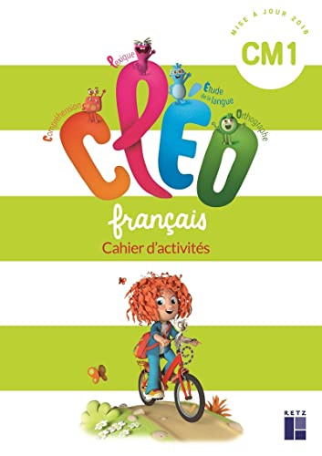 Colorful French language workbook cover with a child riding a bicycle.