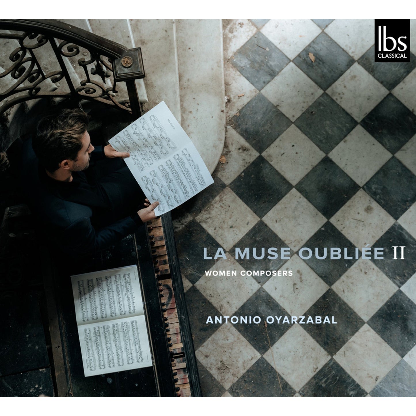 CD cover: Man with sheet music, ornate bench, tiled floor.