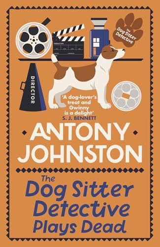 Book cover featuring a dog, film reels, and director’s equipment.