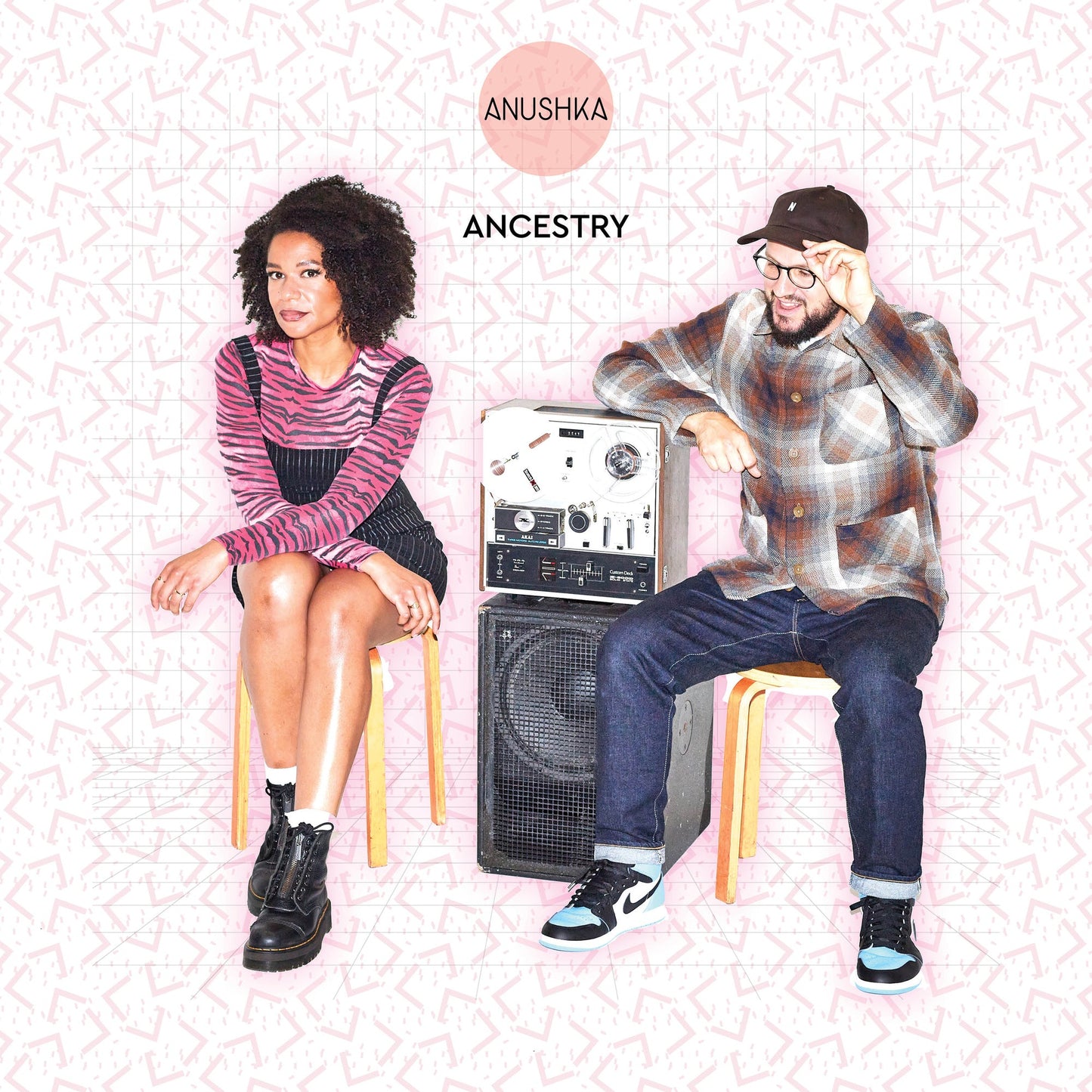 Album cover for Anushka’s “Ancestry” featuring two people and a boombox.