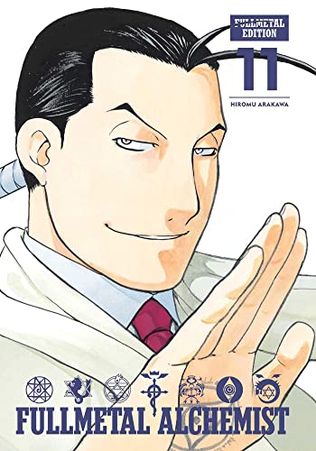 Man with dark hair and red tie on a manga book cover.