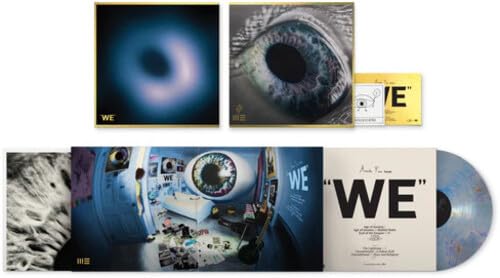 Arcade Fire “WE” vinyl record packaging with eye imagery and blue tint.