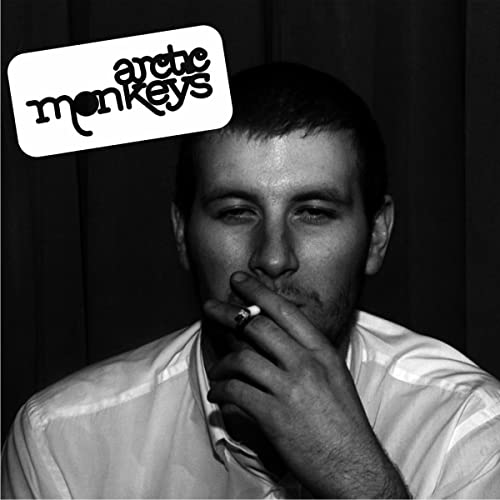 Black and white album cover featuring a man smoking a cigarette.