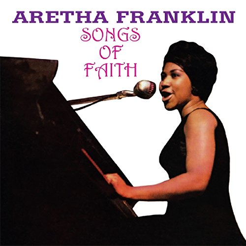 Aretha Franklin at a piano with a microphone, album cover.