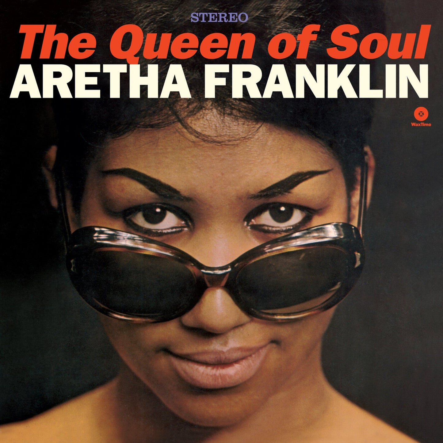 Aretha Franklin album cover, close-up of her face with sunglasses.