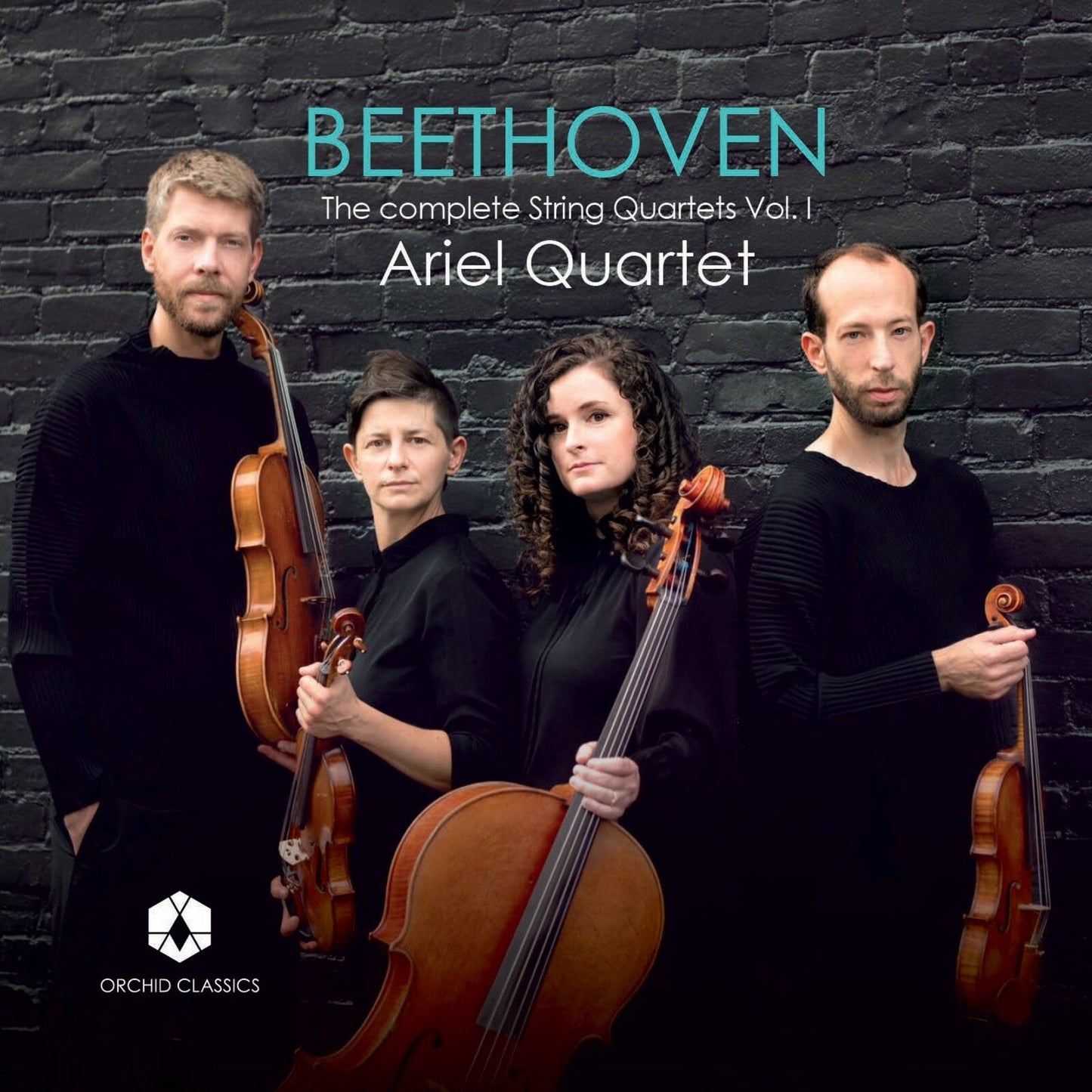 Ariel Quartet posing with string instruments against a dark brick wall.