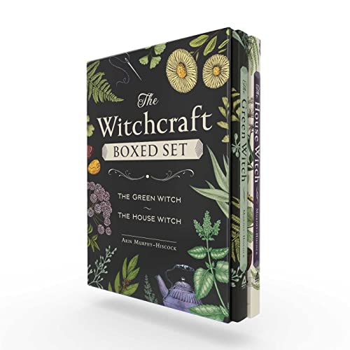 Green and black boxed set of two witchcraft books with floral designs.