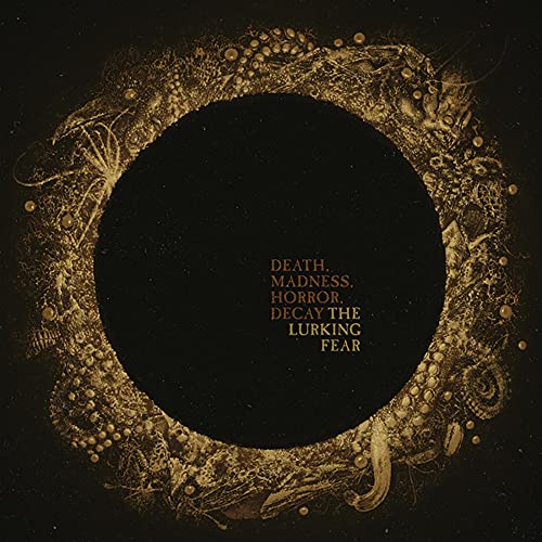 CD cover art: dark gold ornate circle with text and unsettling imagery.