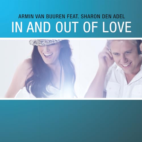 Album cover featuring Armin van Buuren and Sharon den Adel smiling.