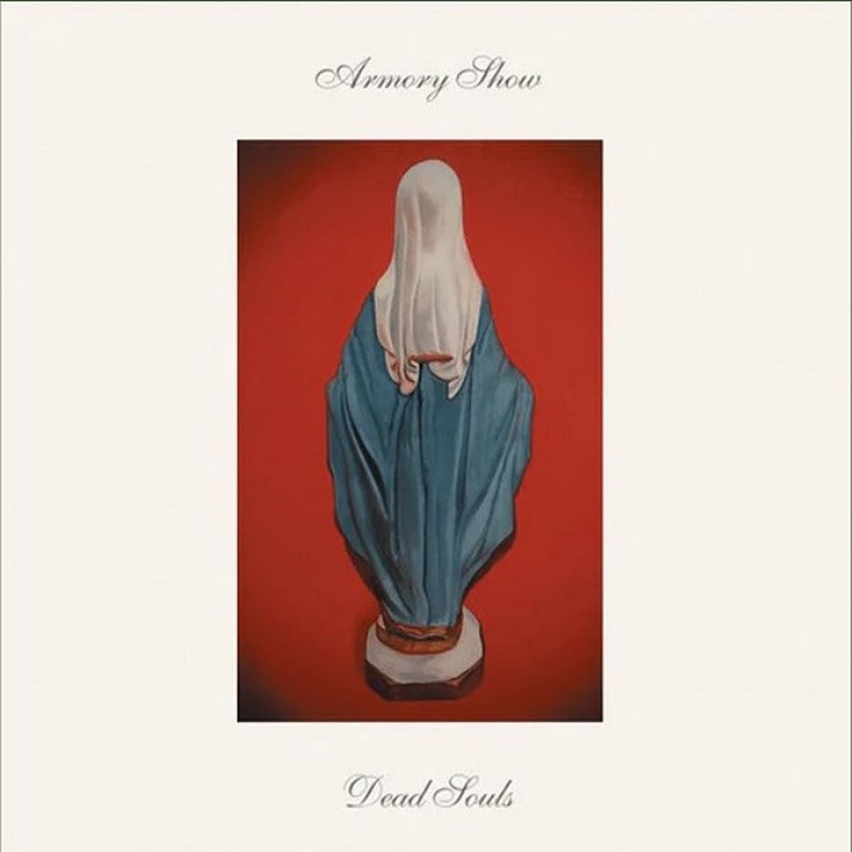 Vinyl album cover: draped figure in blue against a red background.