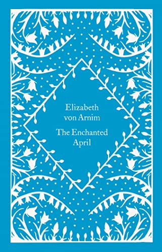 Blue book cover with white floral design and title “The Enchanted April”.