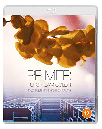 Blu-ray cover for Primer and Upstream Color featuring yellow flowers and two shipping crates.