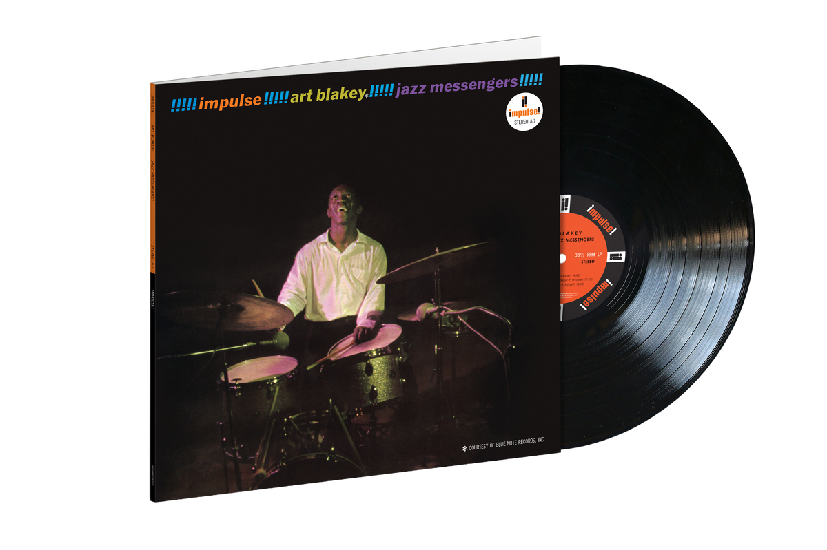 Art Blakey & The Jazz Messengers vinyl record with drummer portrait.