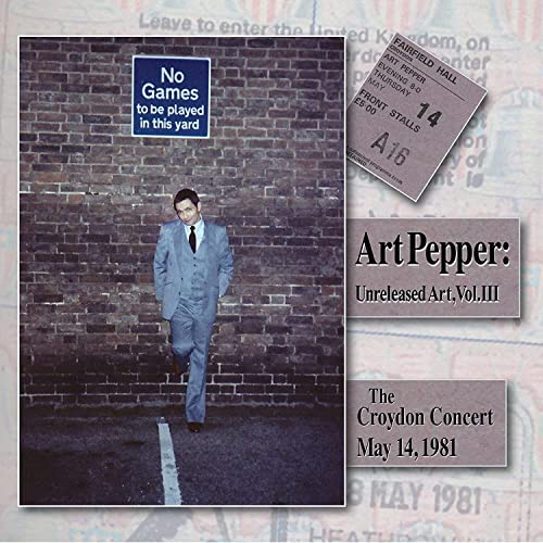 CD cover: man in suit, brick wall, "No Games" sign, text details.