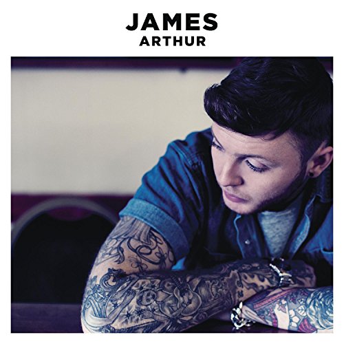 James Arthur album cover featuring a portrait of the singer with tattoos.