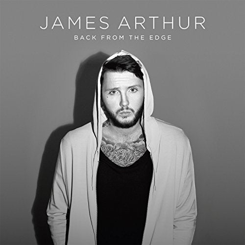 Black and white album cover featuring a man in a hooded jacket.
