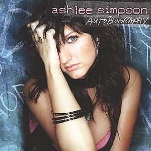 Ashlee Simpson album cover, close-up portrait with dark hair and blue eyes.