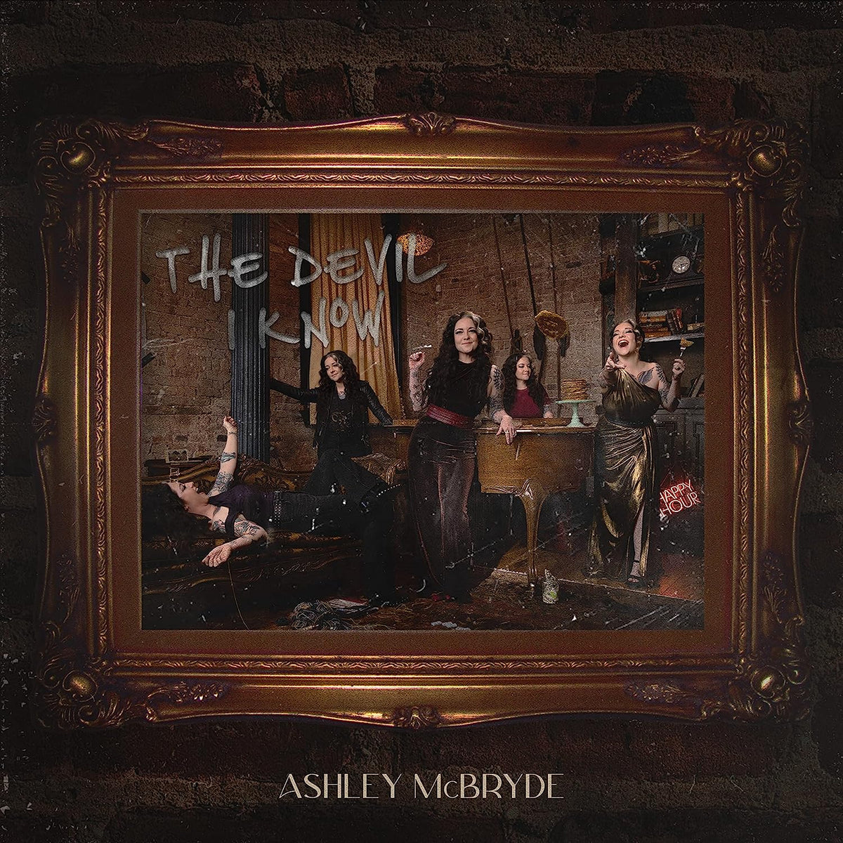 Ashley McBryde album cover: ornate frame, woman with figures in a dimly lit room.