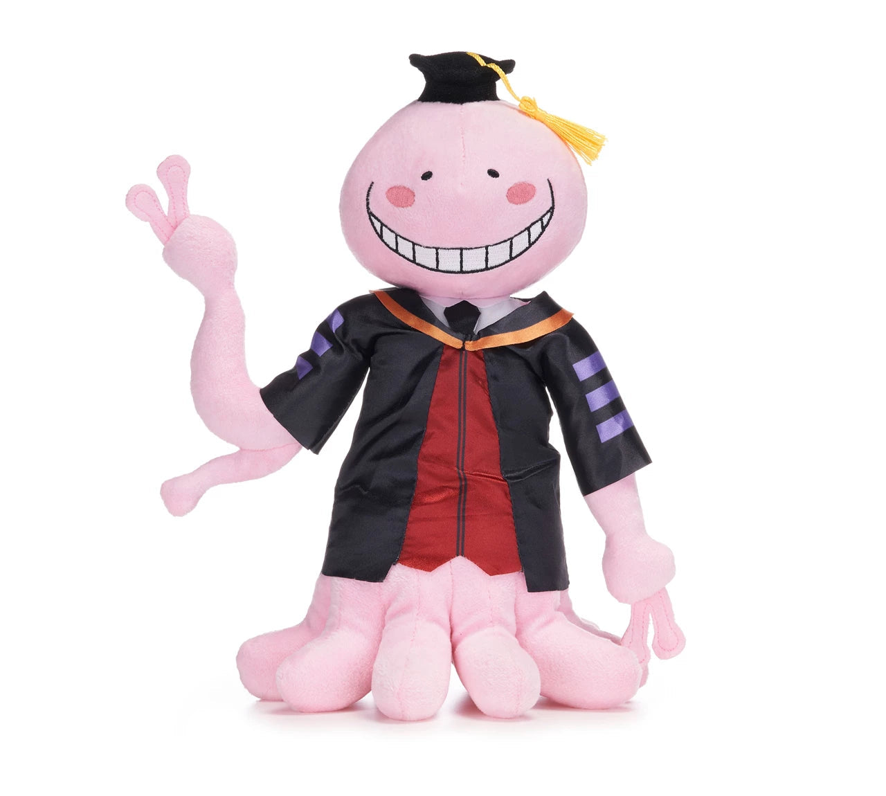 Pink octopus plush toy in graduation gown, giving a peace sign.