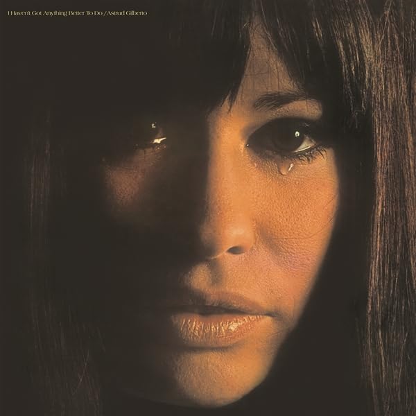 Close-up portrait of Astrud Gilberto with a tear on her cheek.