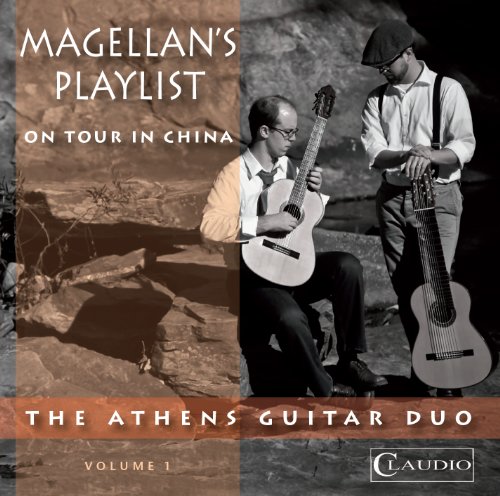 DVD cover of two men playing guitars, outdoors, with rocky background and text overlays.