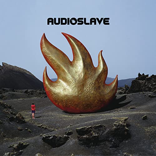 Audioslave album cover with a large golden flame and desert landscape.