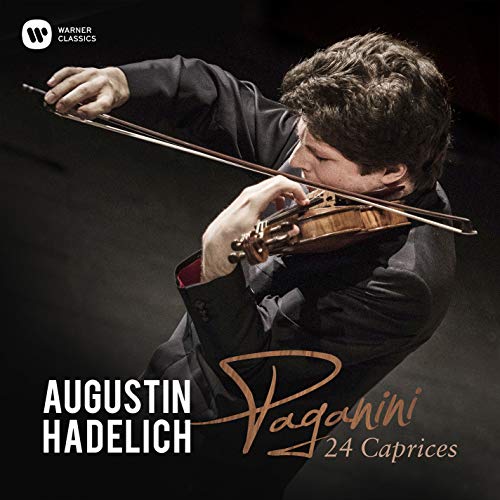 Augustin Hadelich playing violin on "Paganini Caprices" CD cover, Warner Classics logo visible.