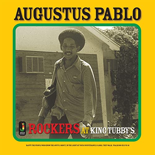 Augustus Pablo album cover, a portrait of a man with an afro, smiling.