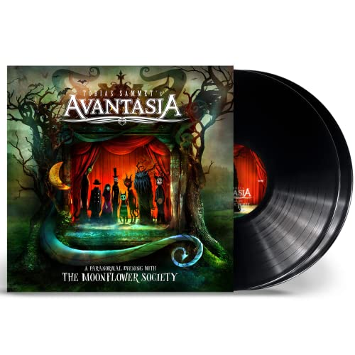 Vinyl record and album cover art featuring surreal figures on a dark, theatrical stage.