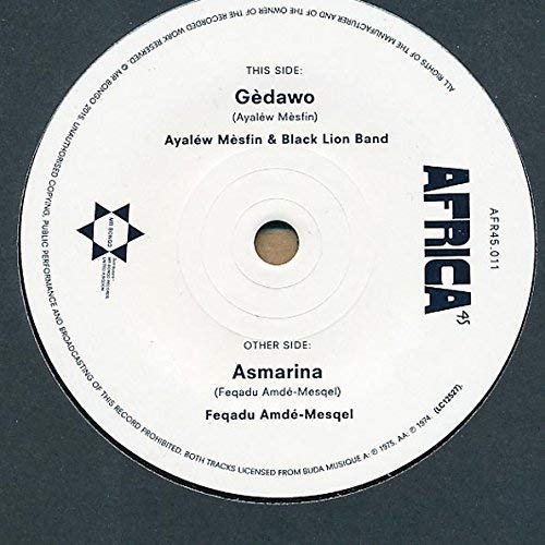 White vinyl record label with black text listing tracks Gèdawo and Asmarina.