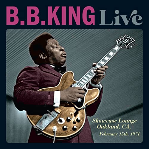 B.B. King playing a guitar on the album cover "Live".