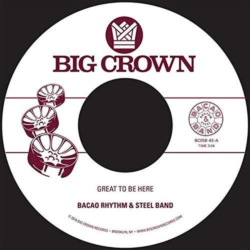 White vinyl record label with “Big Crown” text and steelpan drum graphics.